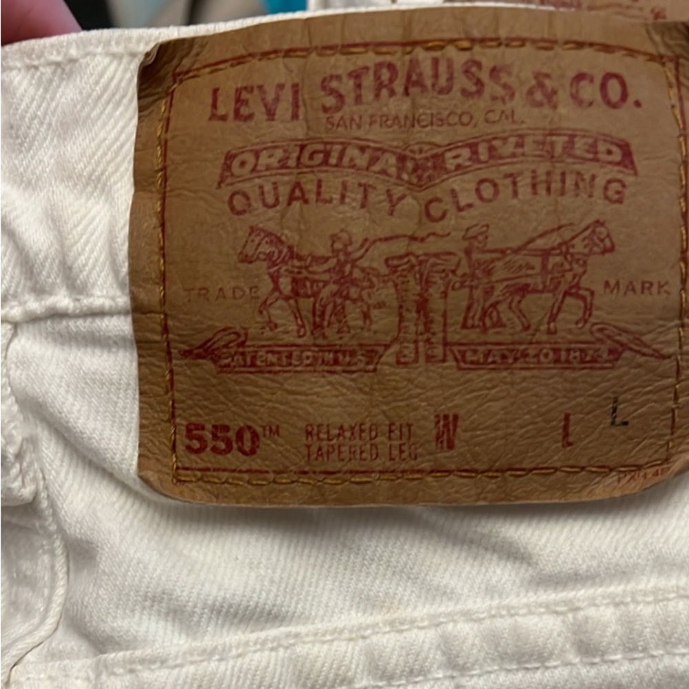 Vintage Levi’s 550 size 5/ long length ECU white Relaxed and Tapered